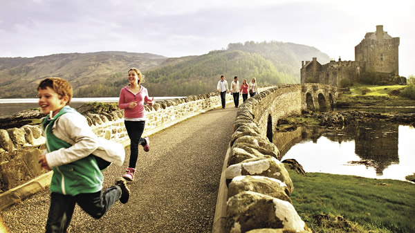 Adventures-by-Disney-guests-visit-Eilean-Donan-Castle.